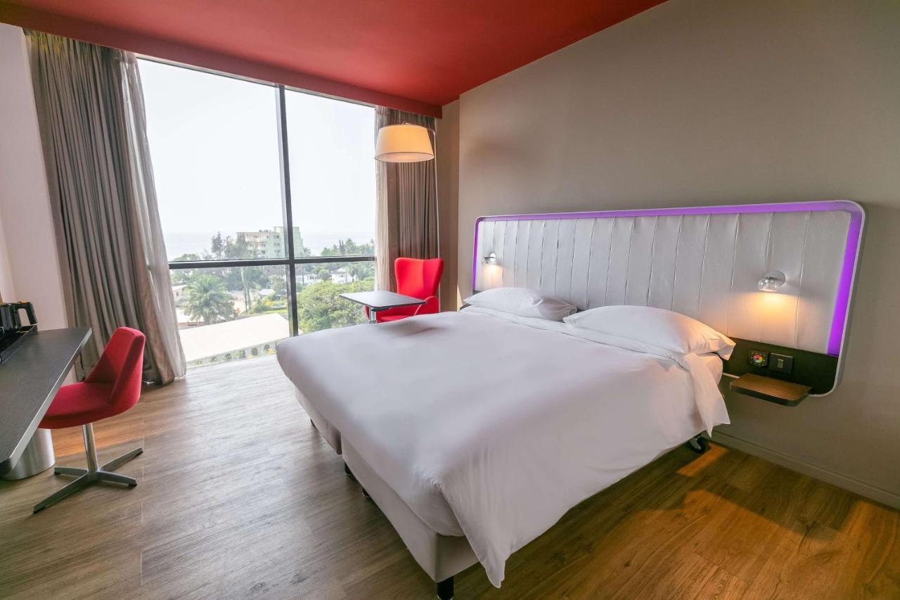 Park Inn By Radisson Либревиль Экстерьер фото